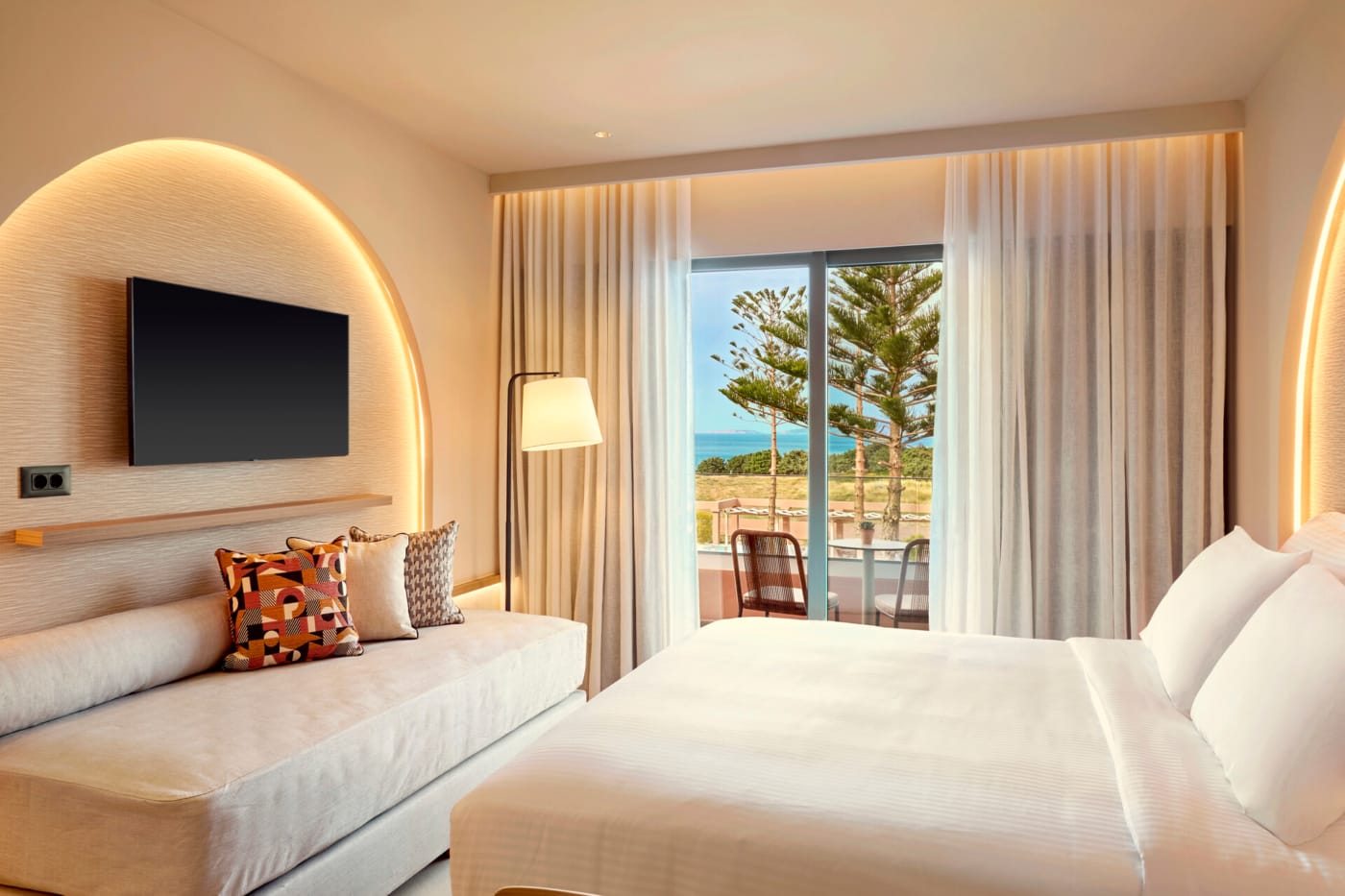 a bedroom with a large window