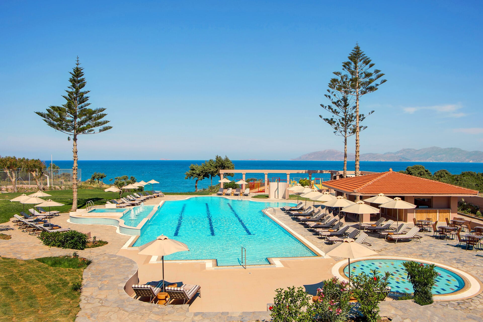 a pool next to a beach