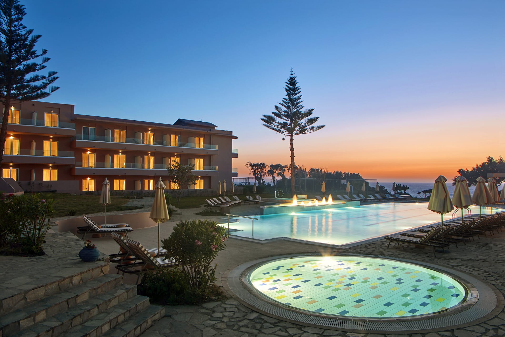 a pool in front of a house