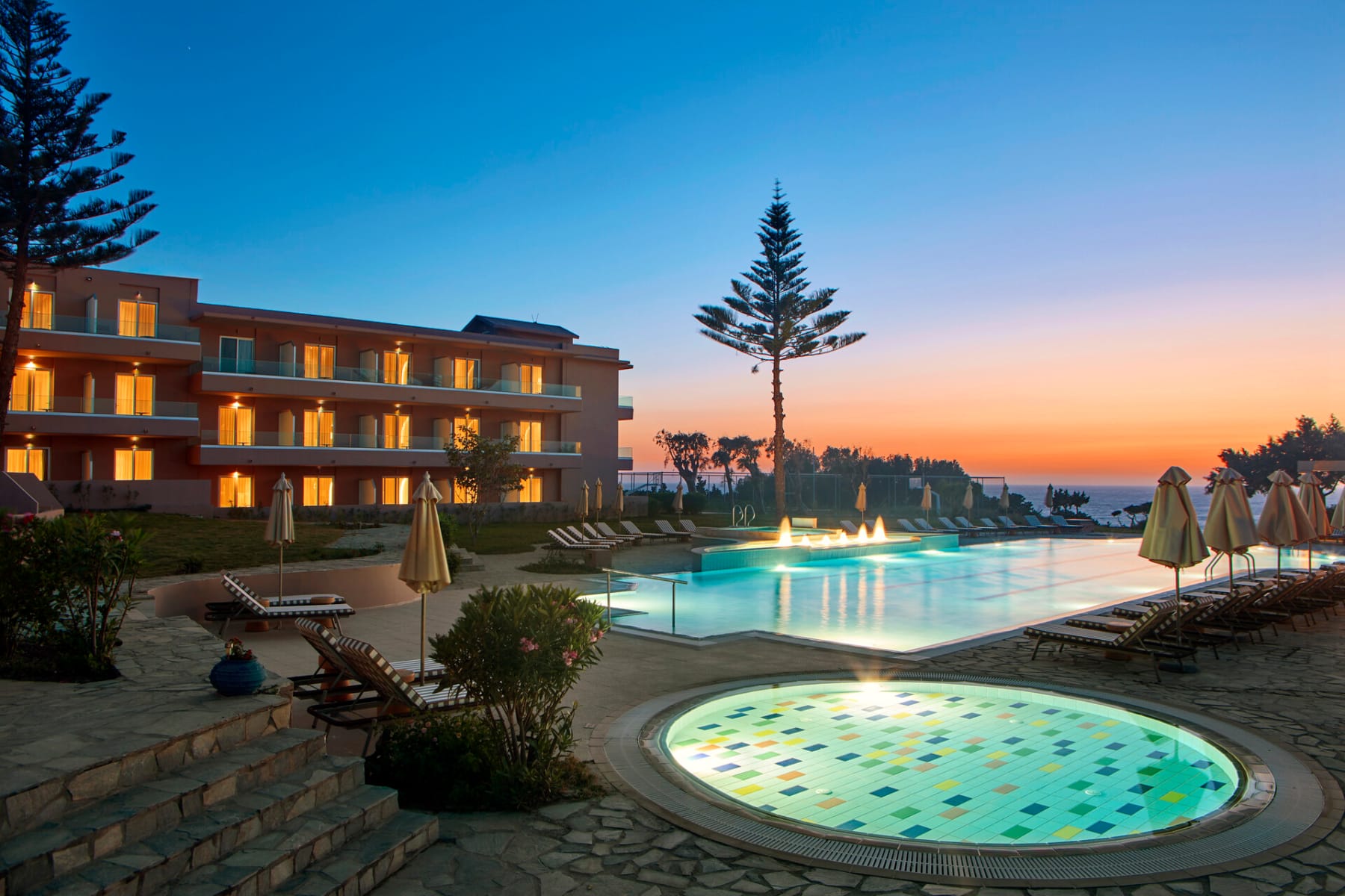 a pool in front of a house