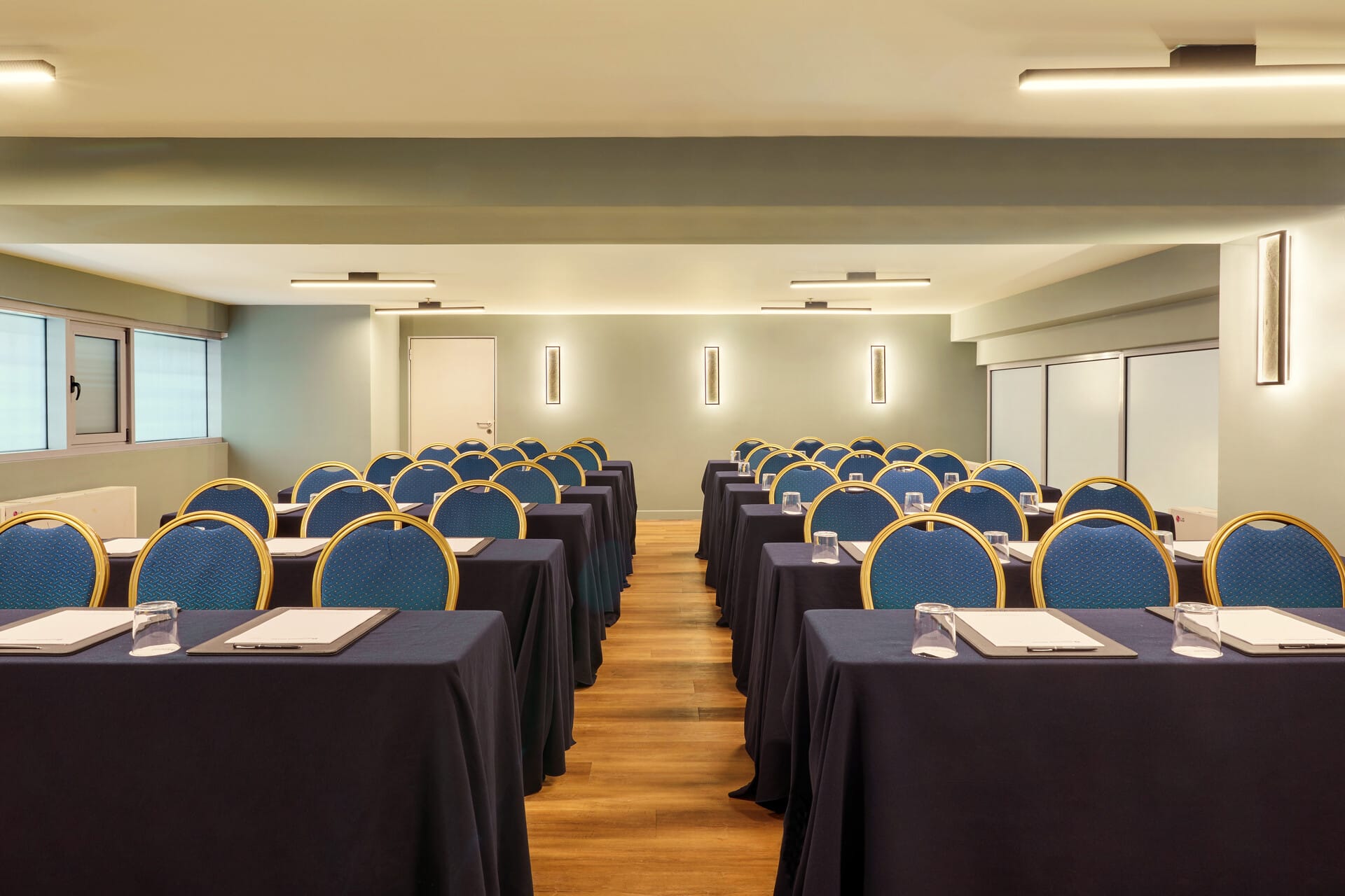 a room with tables and chairs