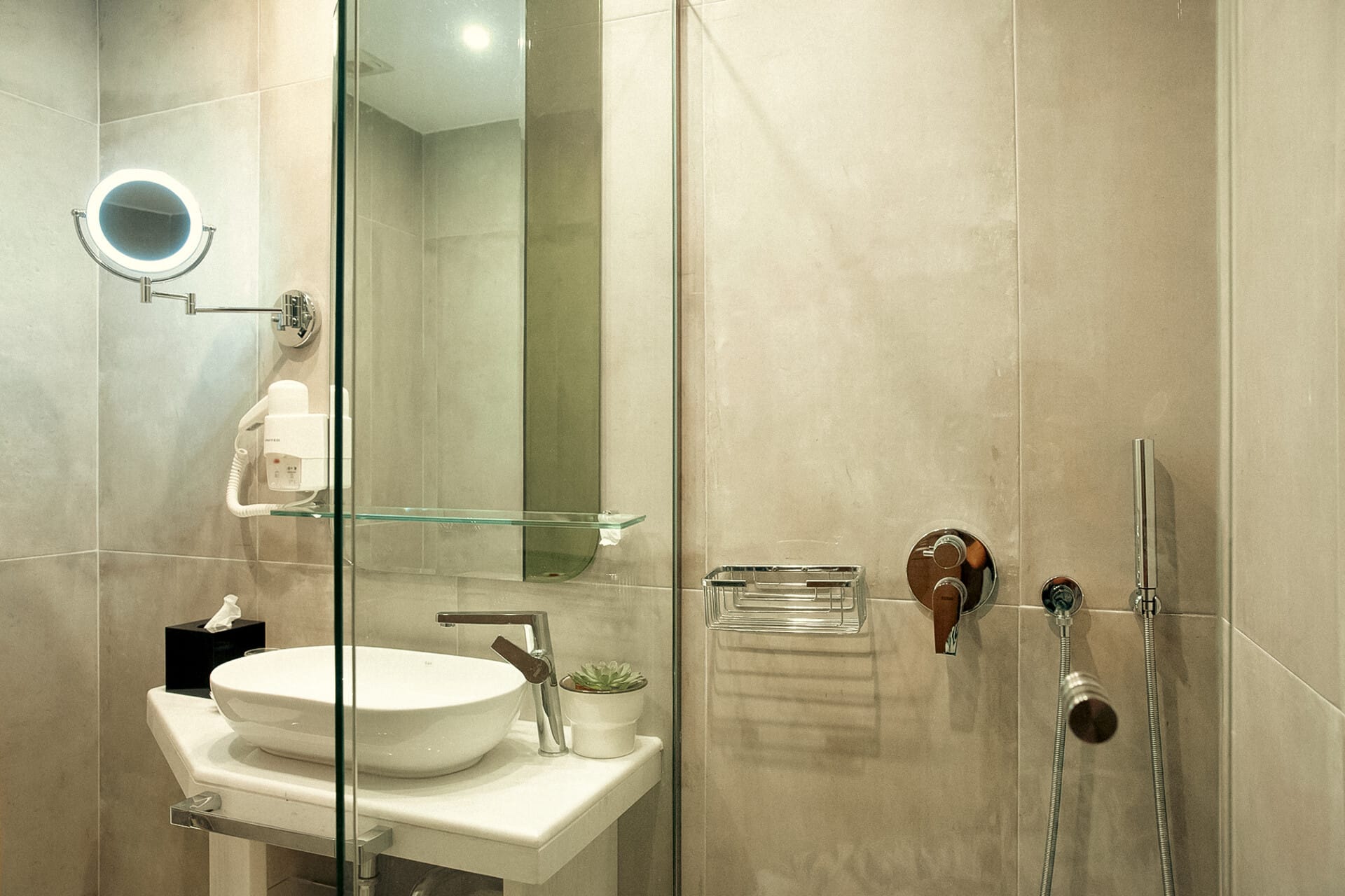 a bathroom with a glass shower