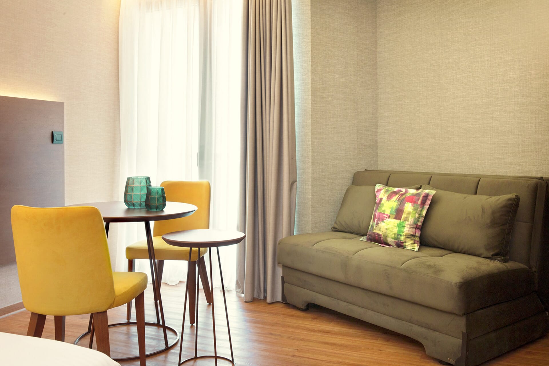 a living room with a couch and a table