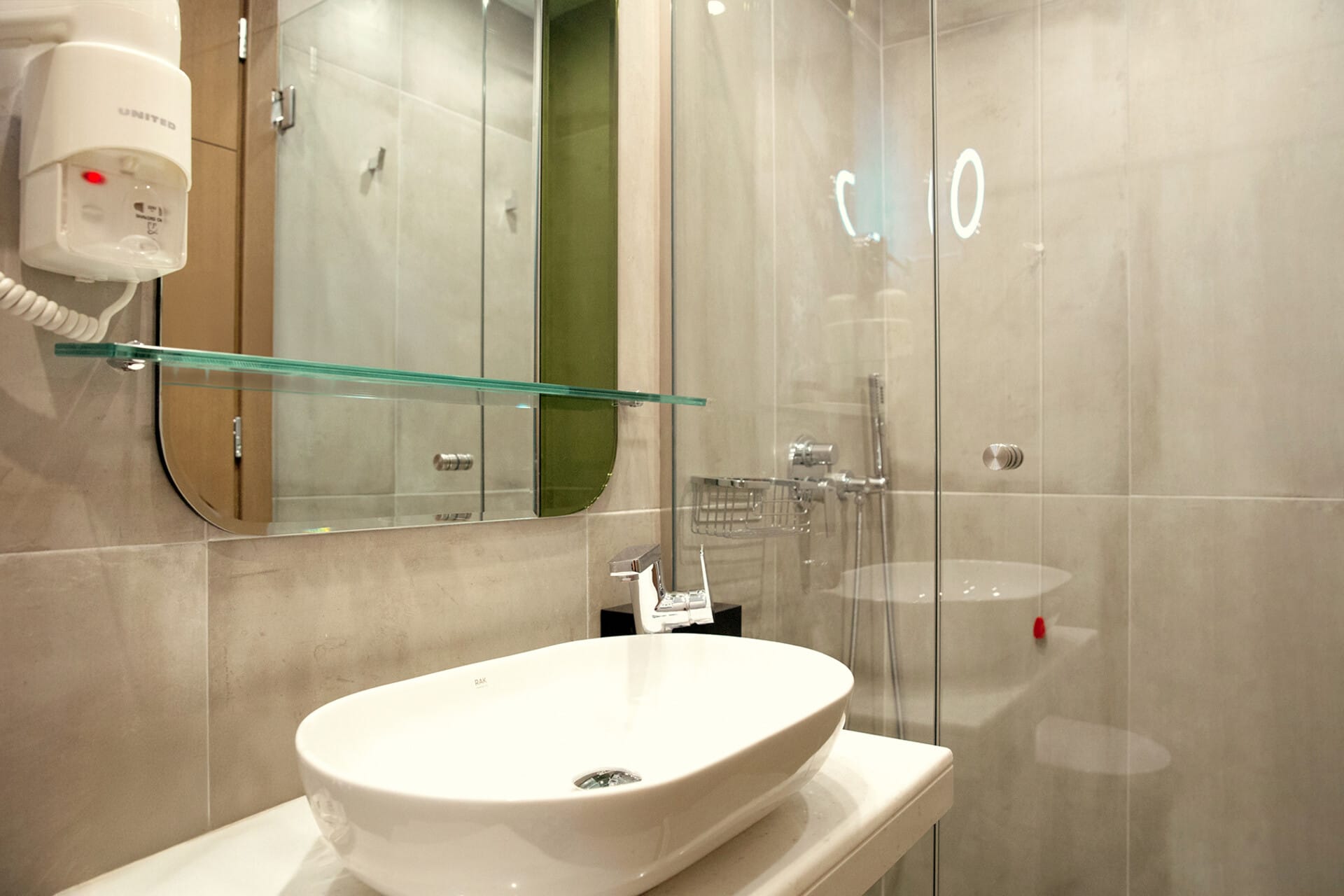 a bathroom with a glass shower