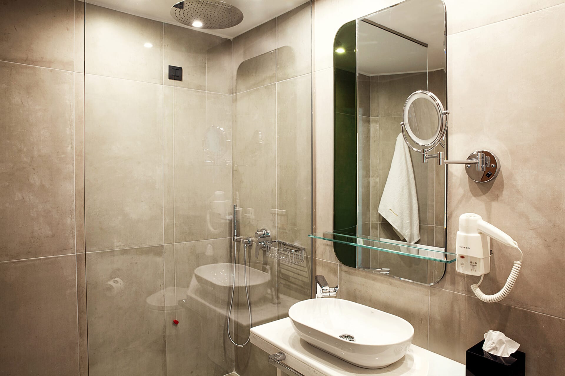 a bathroom with a glass shower