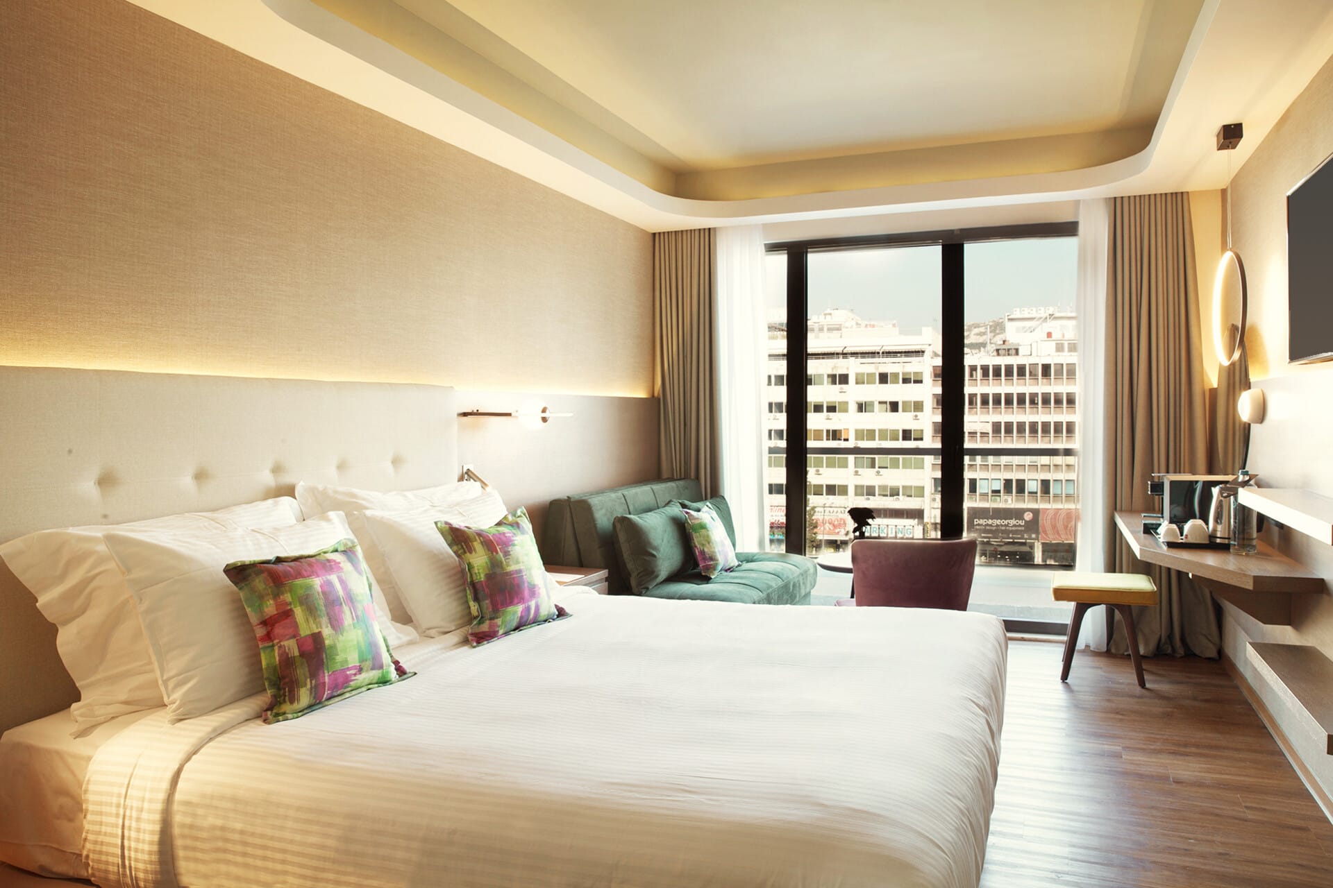 a bedroom with a large window