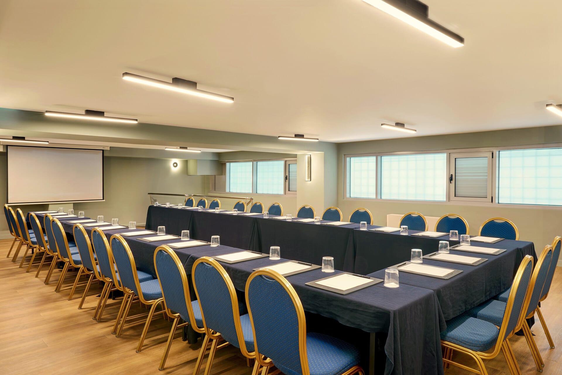 a room with a table and chairs