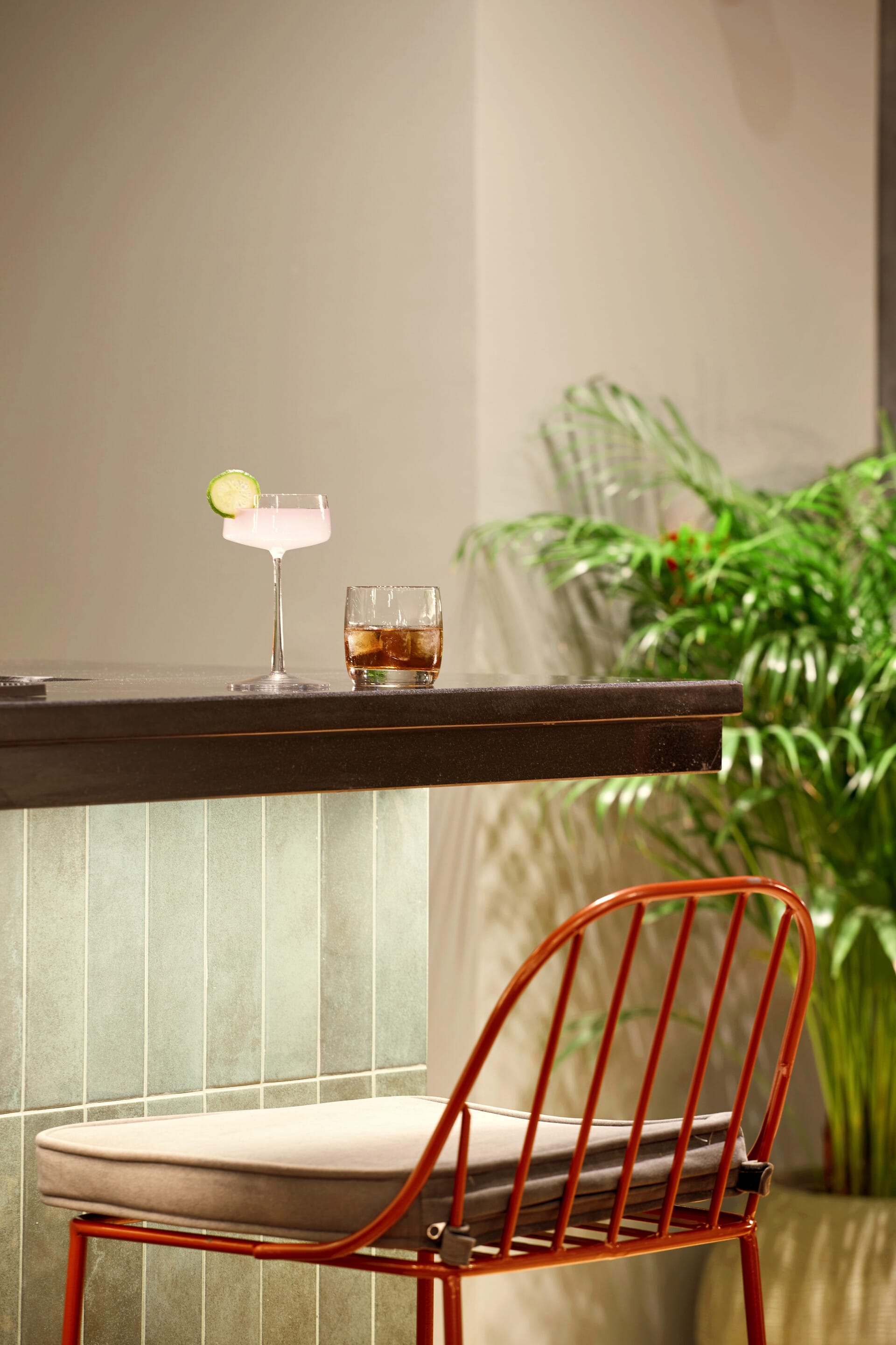 a glass of liquid on a table