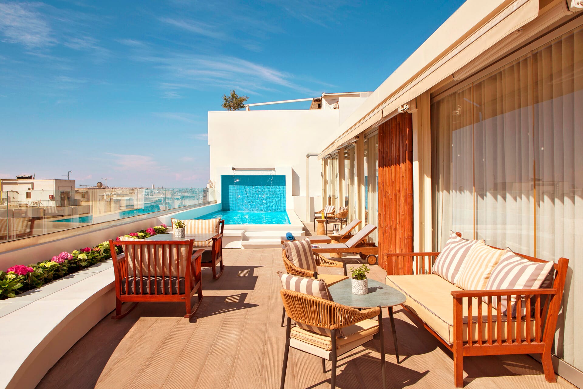 a deck with chairs and tables