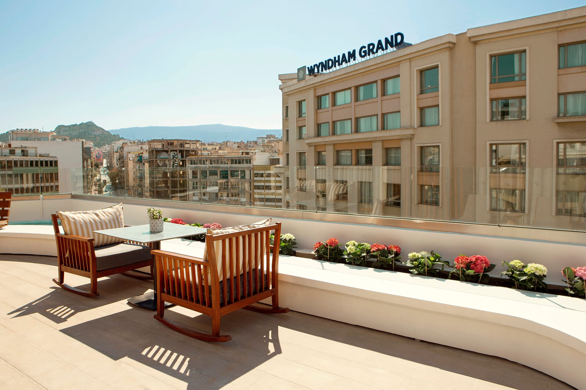 a group of tables and chairs outside a building