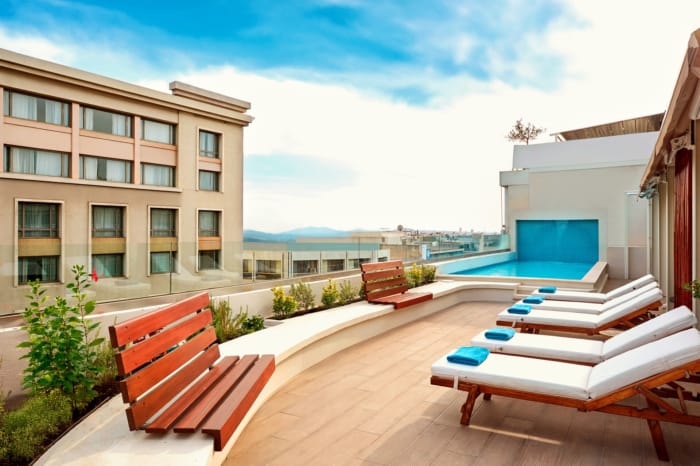 a deck with chairs and tables