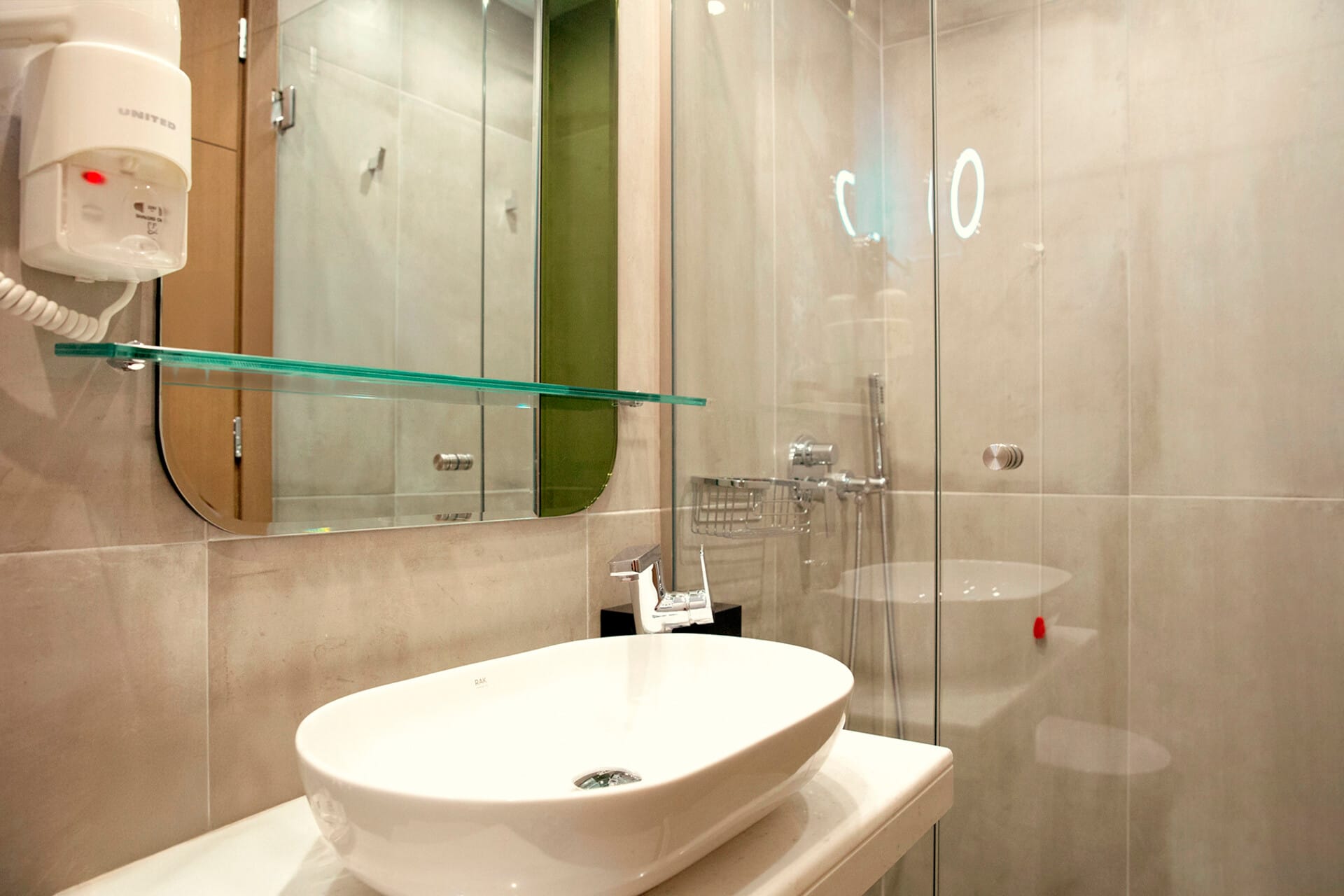 a bathroom with a glass shower