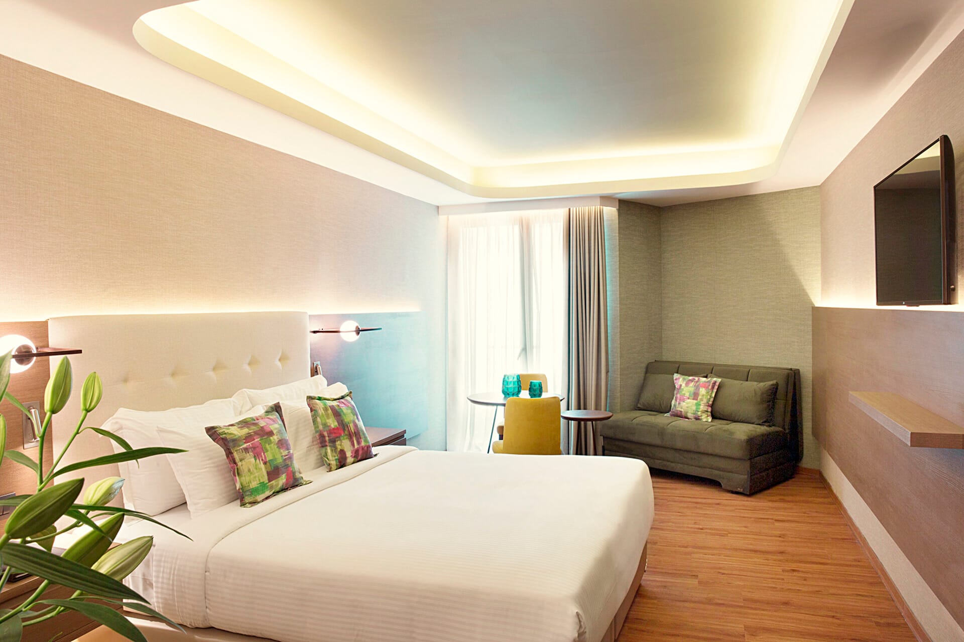 a room with a bed and couch