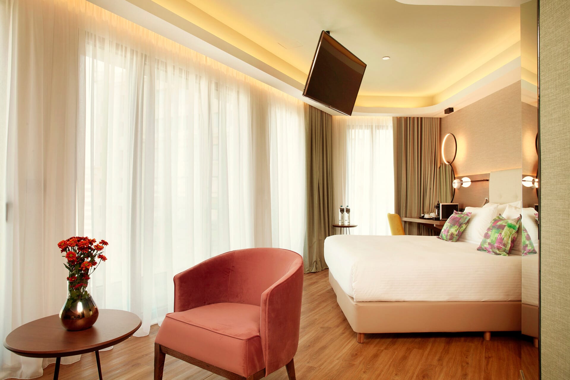 a bedroom with a bed and a chair