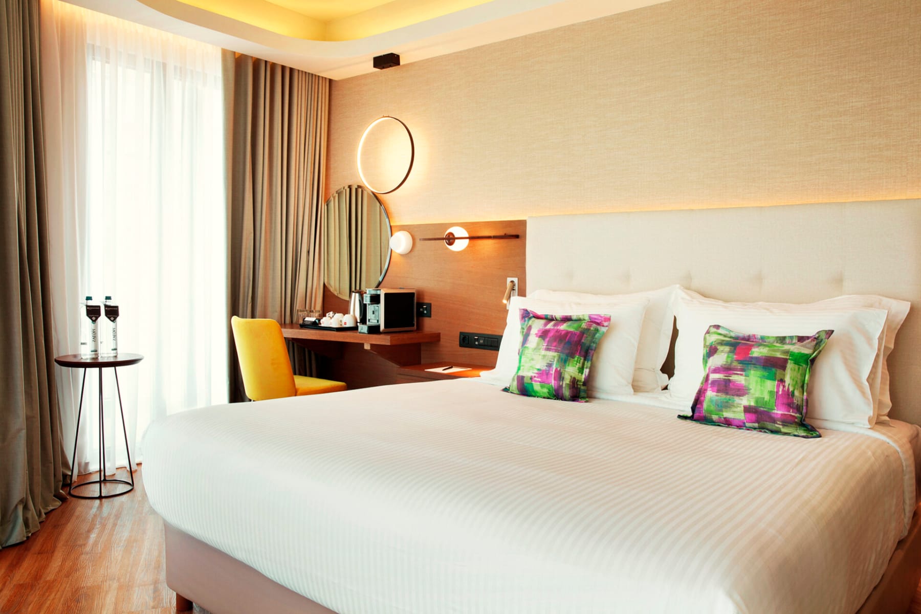 a bed with a white bed spread