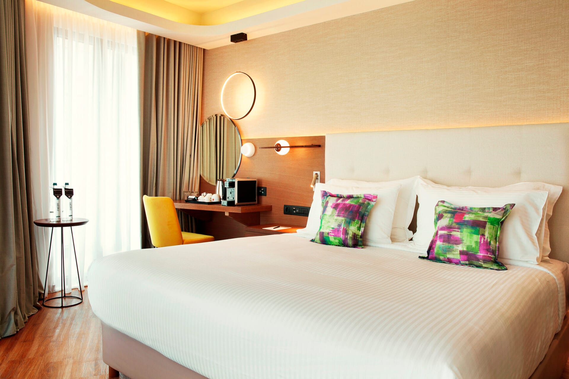 a bed with a white bed spread
