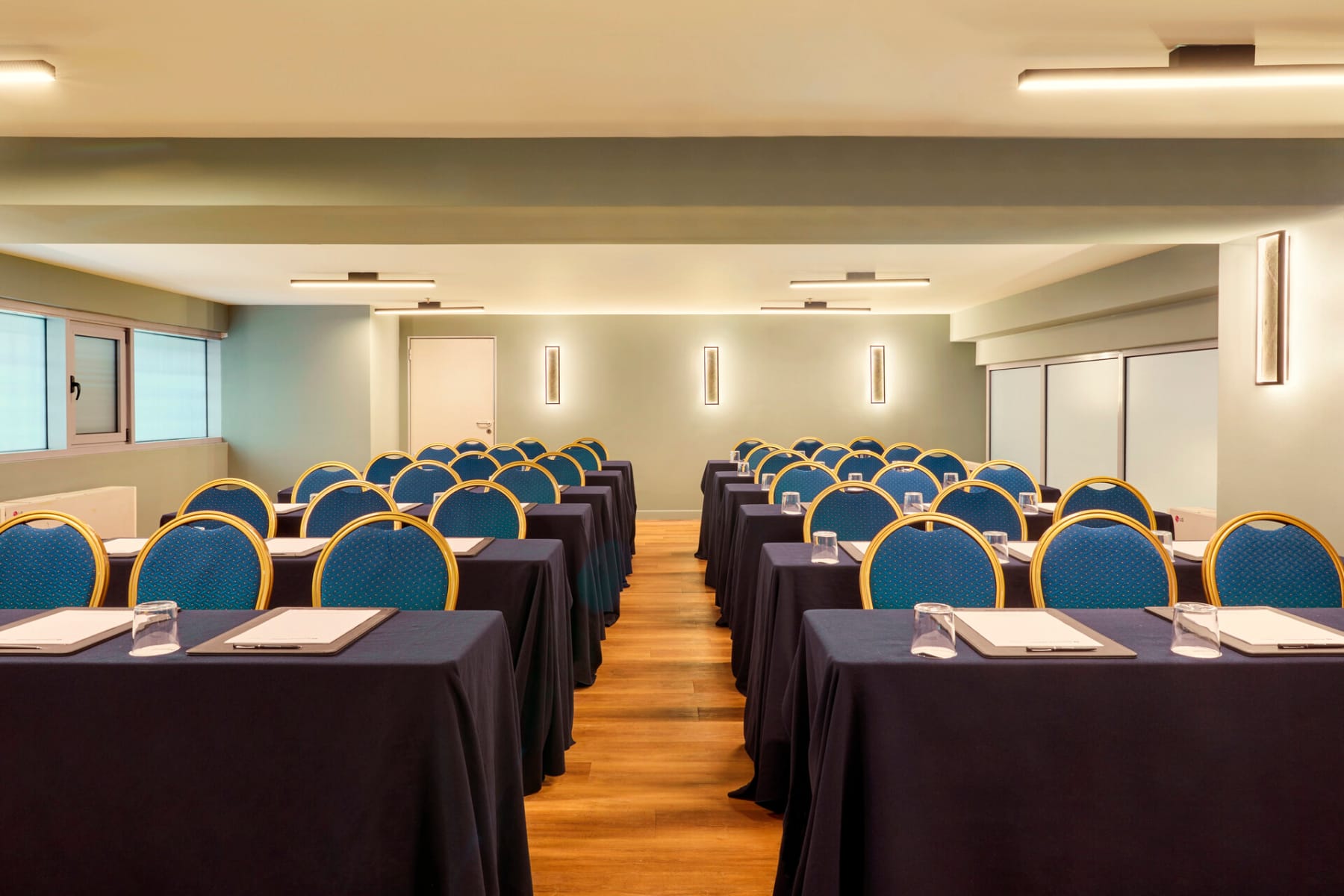 a room with tables and chairs