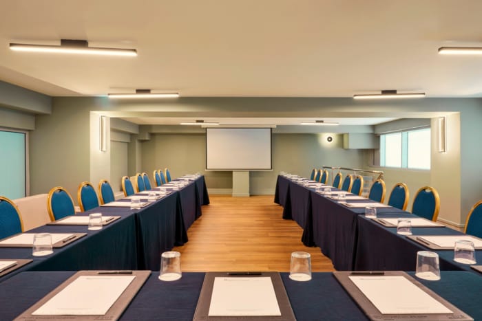 a room with tables and chairs