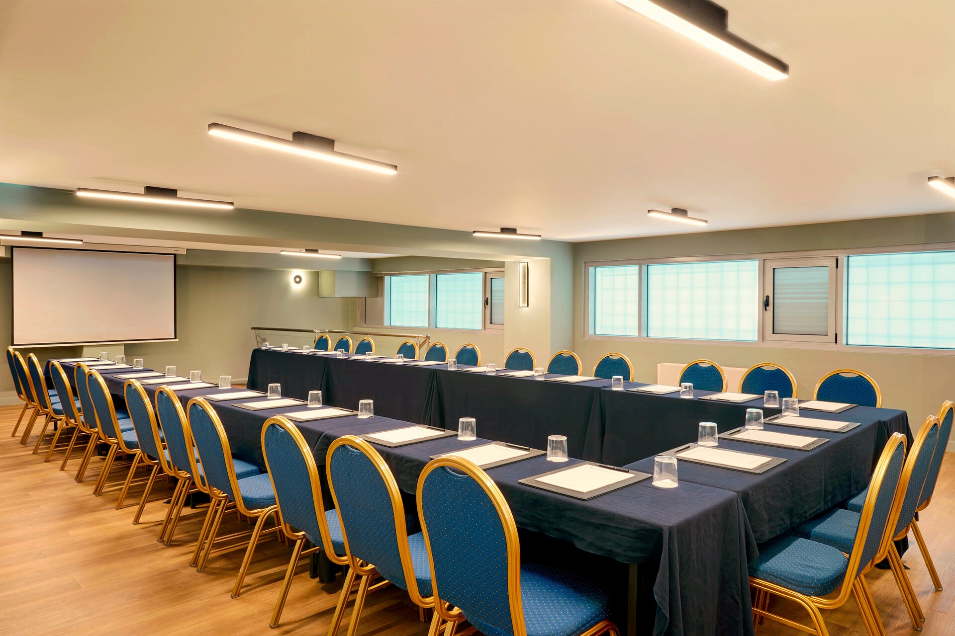 a room with a table and chairs