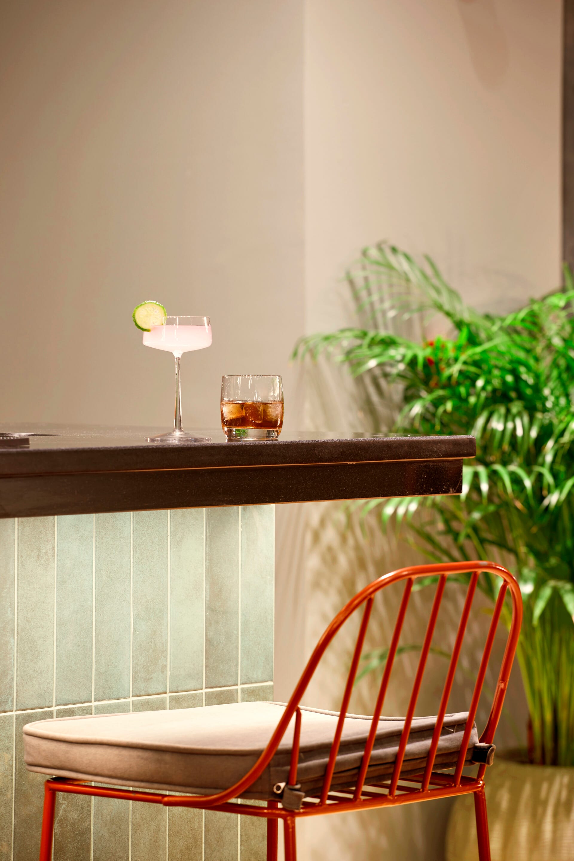 a glass of liquid on a table