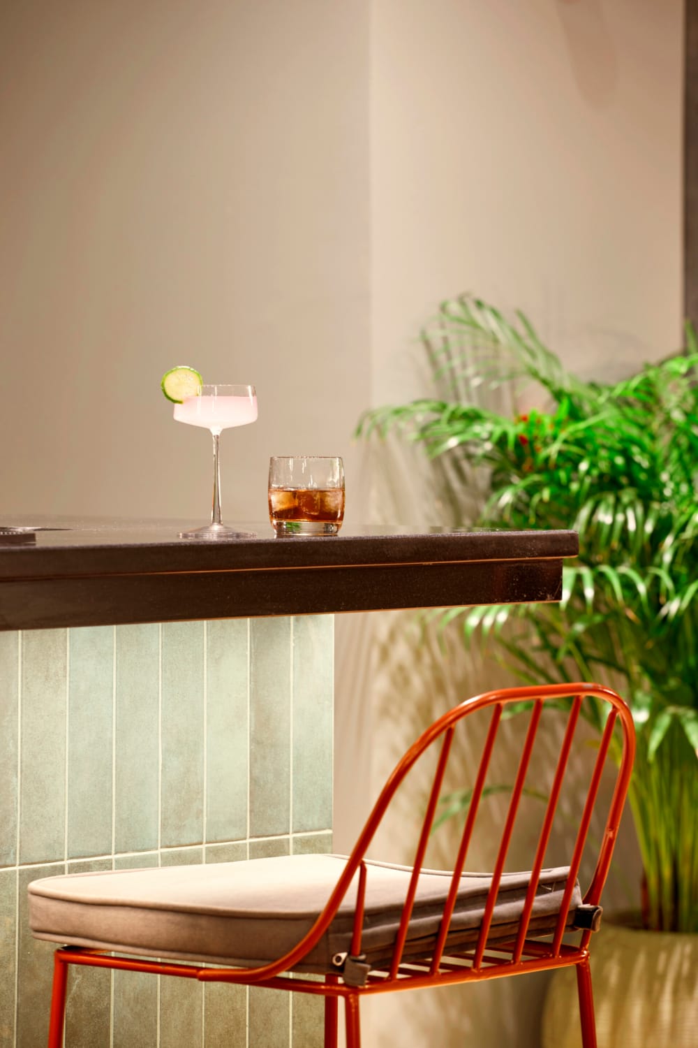 a glass of liquid on a table