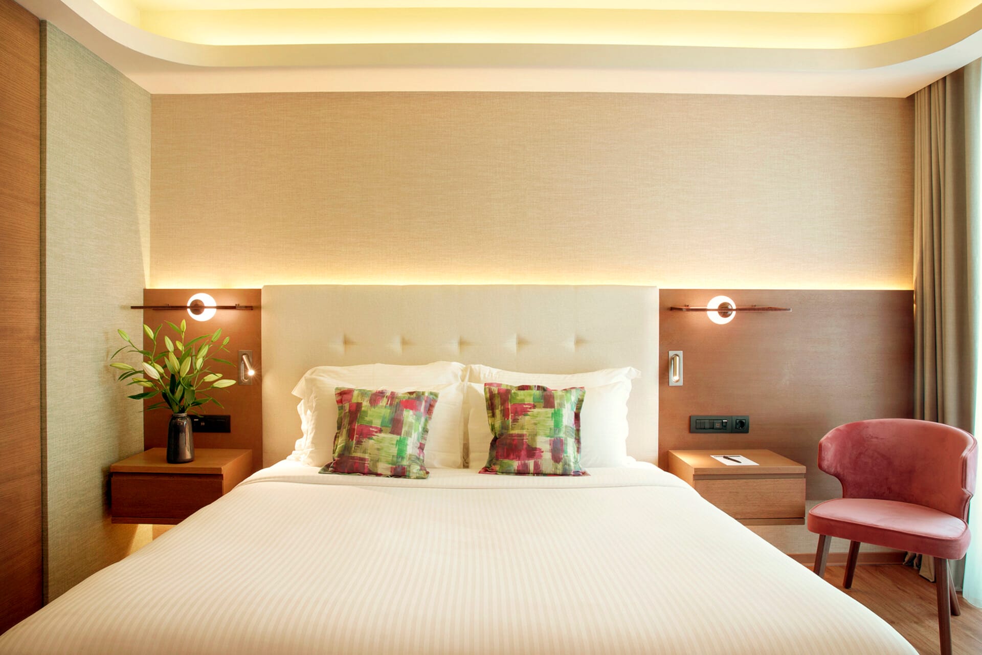 a bed with a white bed spread