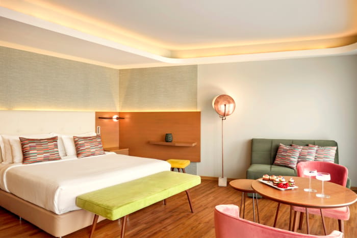 a room with a bed and couch