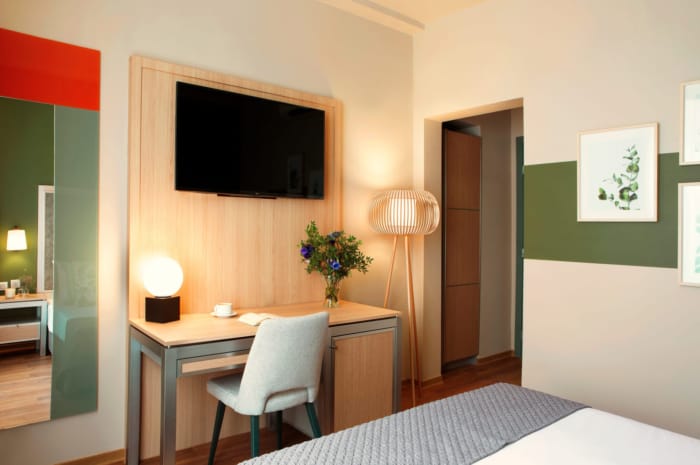 a room with a table and chairs