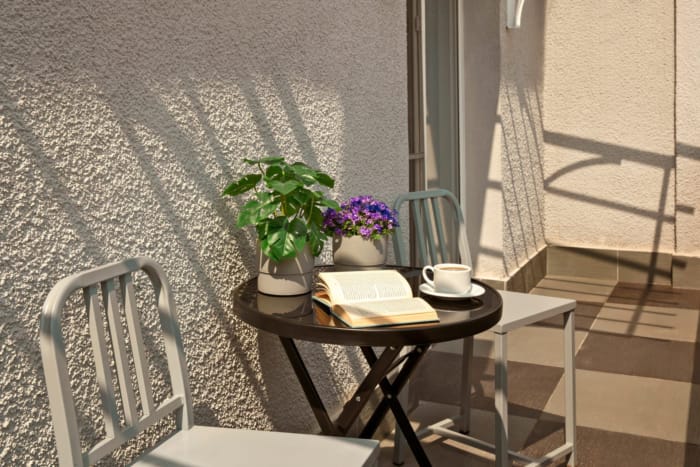 a table with a book and flowers on it