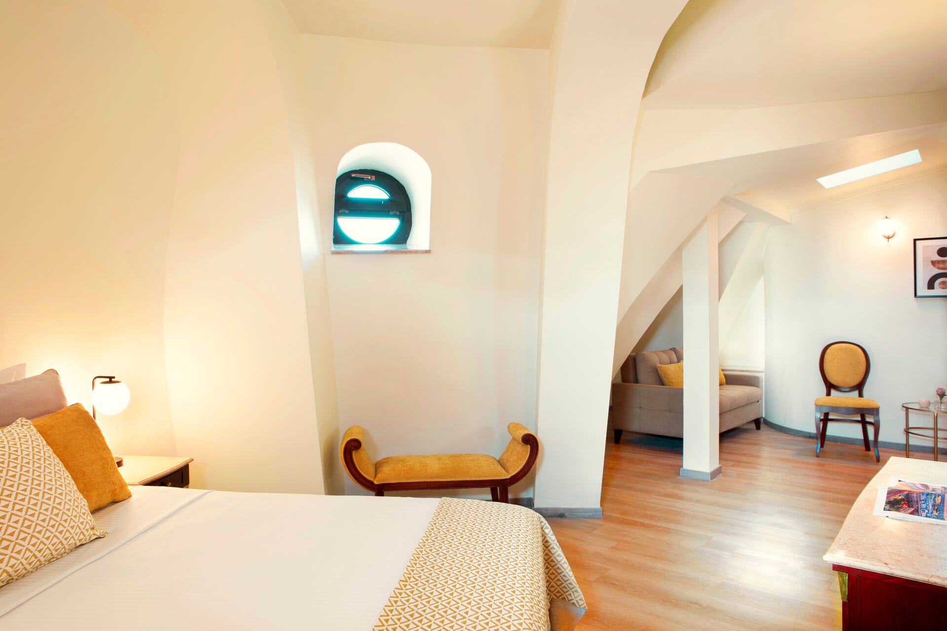 a room with a bed and a chair