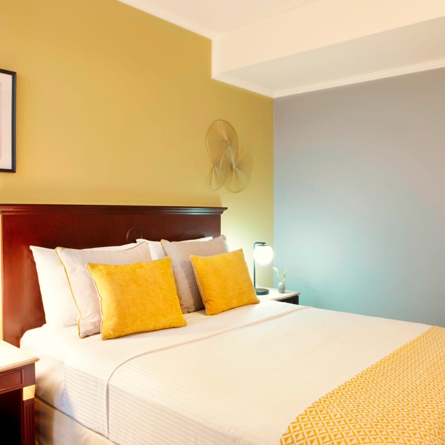 a hotel room with two beds