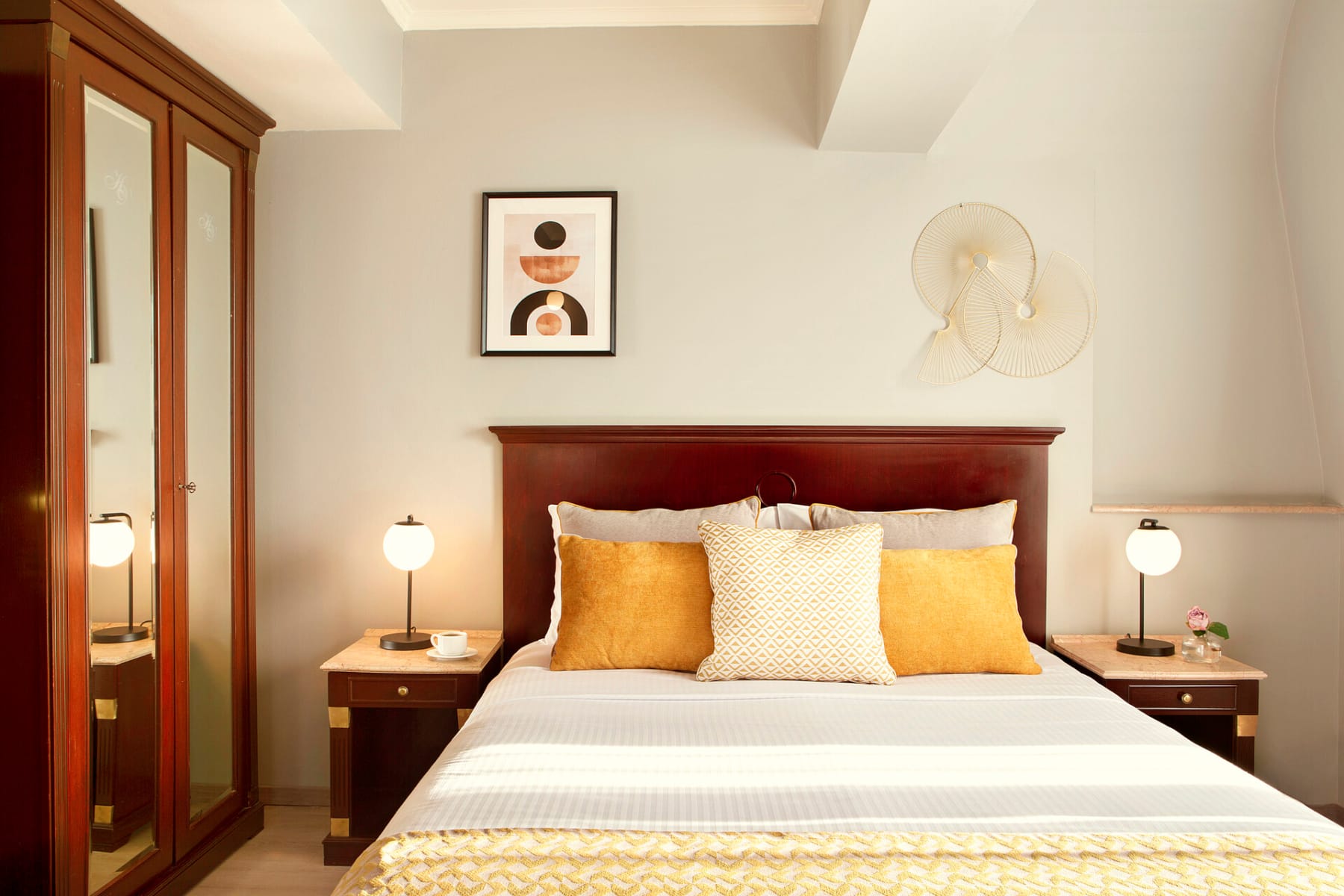 a bed with a white bed spread