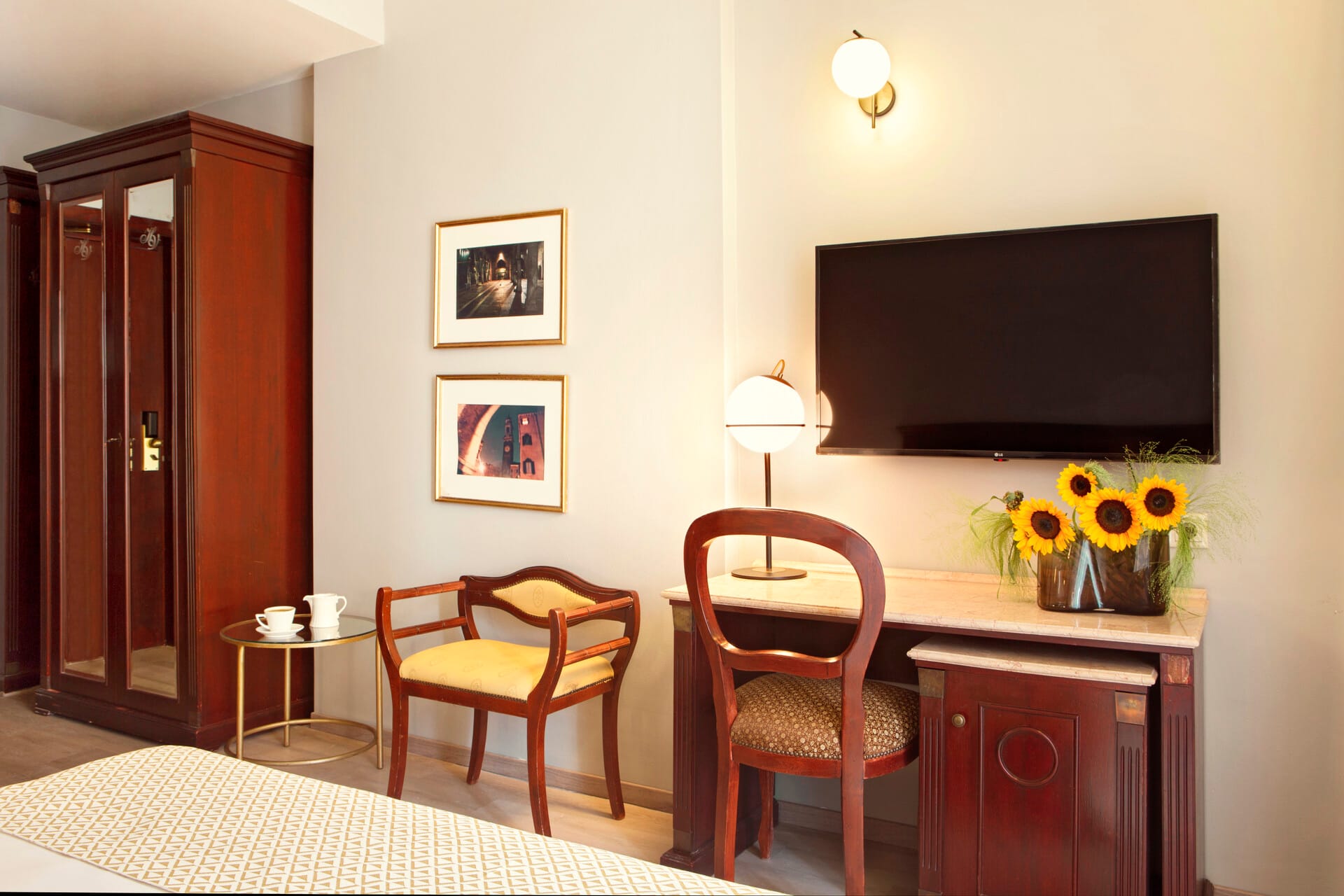 a room with a tv and chairs