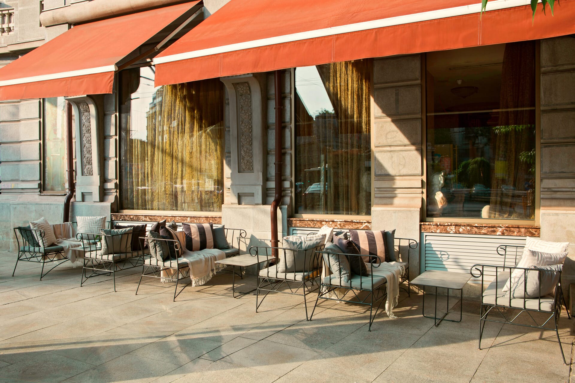 a restaurant with tables and chairs