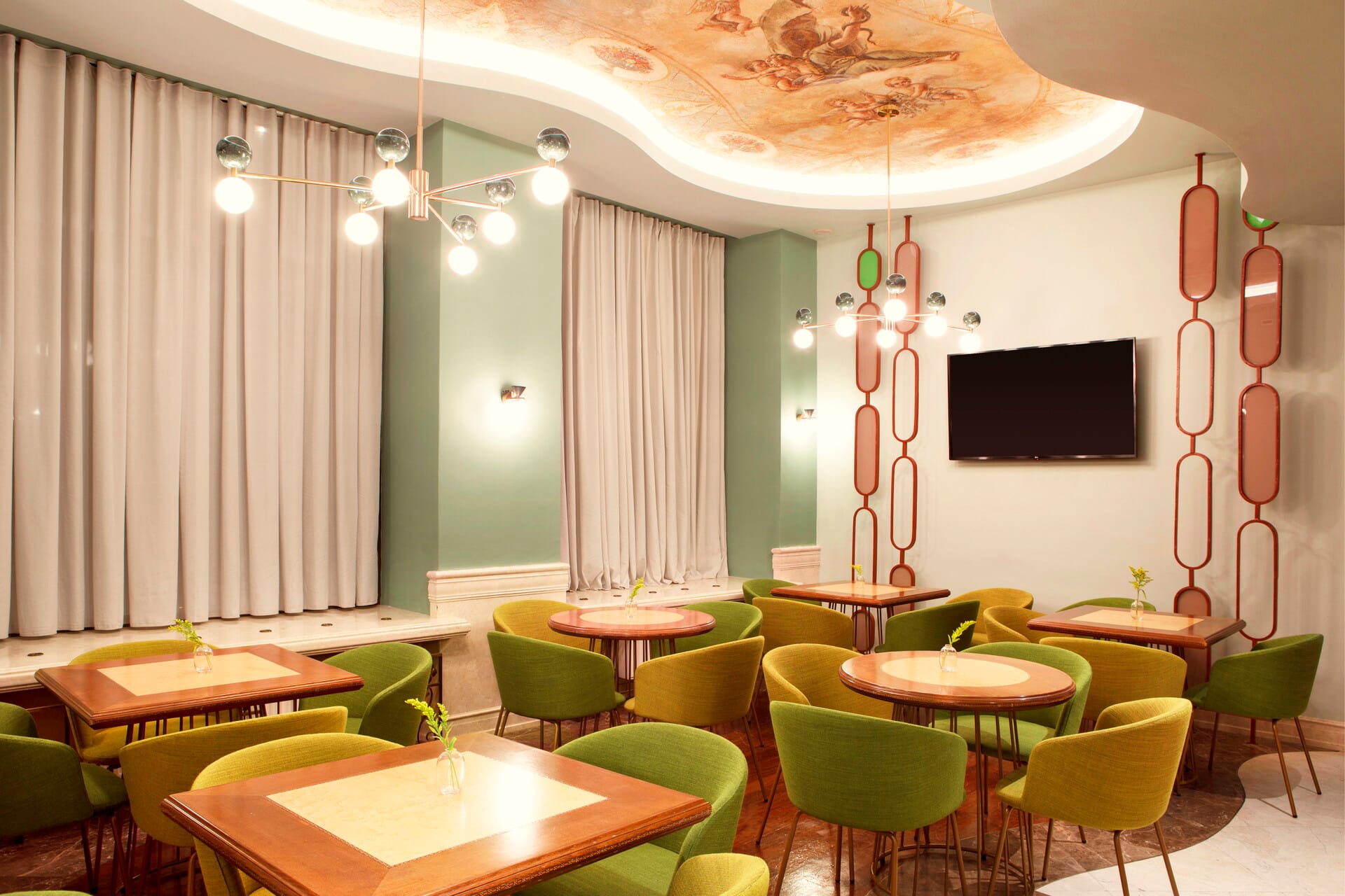 a room with tables and chairs