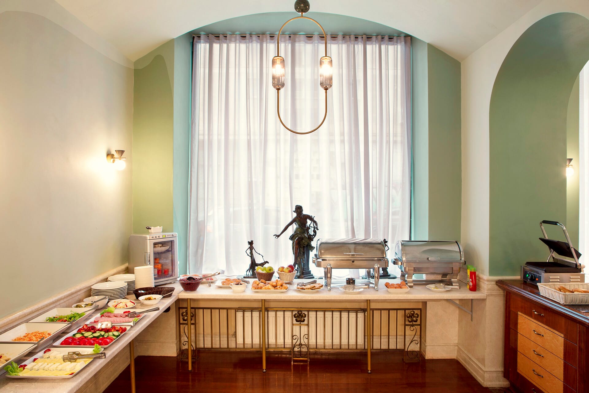 a kitchen with a table and a window