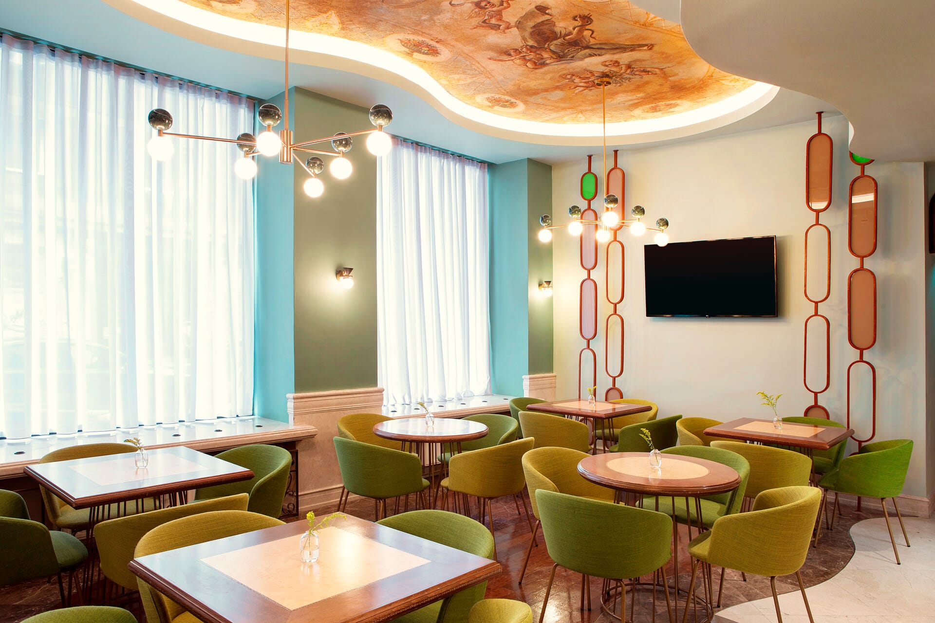 a room with tables and chairs