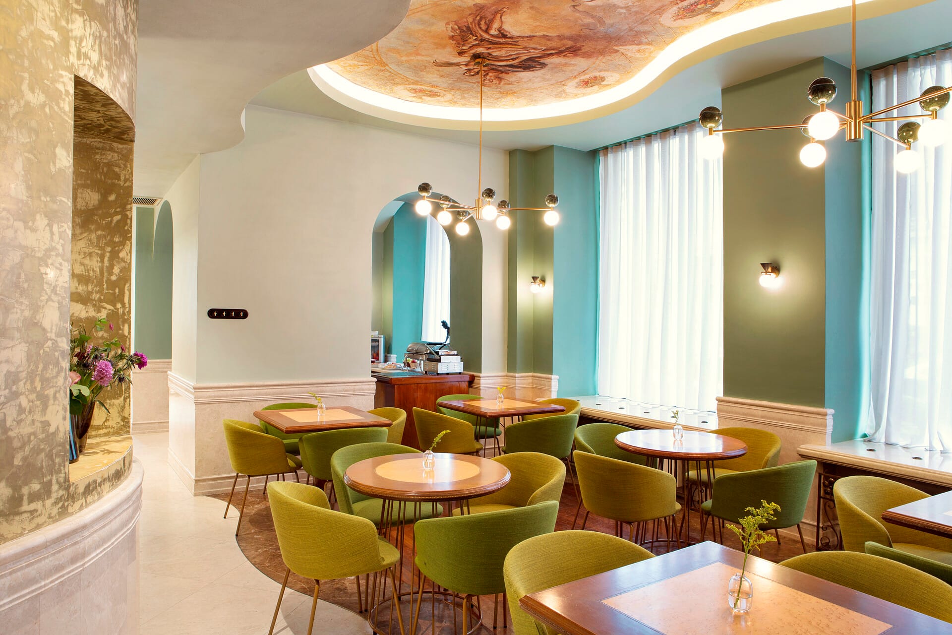 a room with tables and chairs