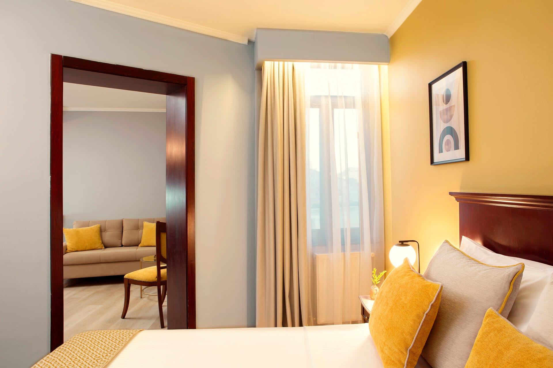 a bedroom with a large window