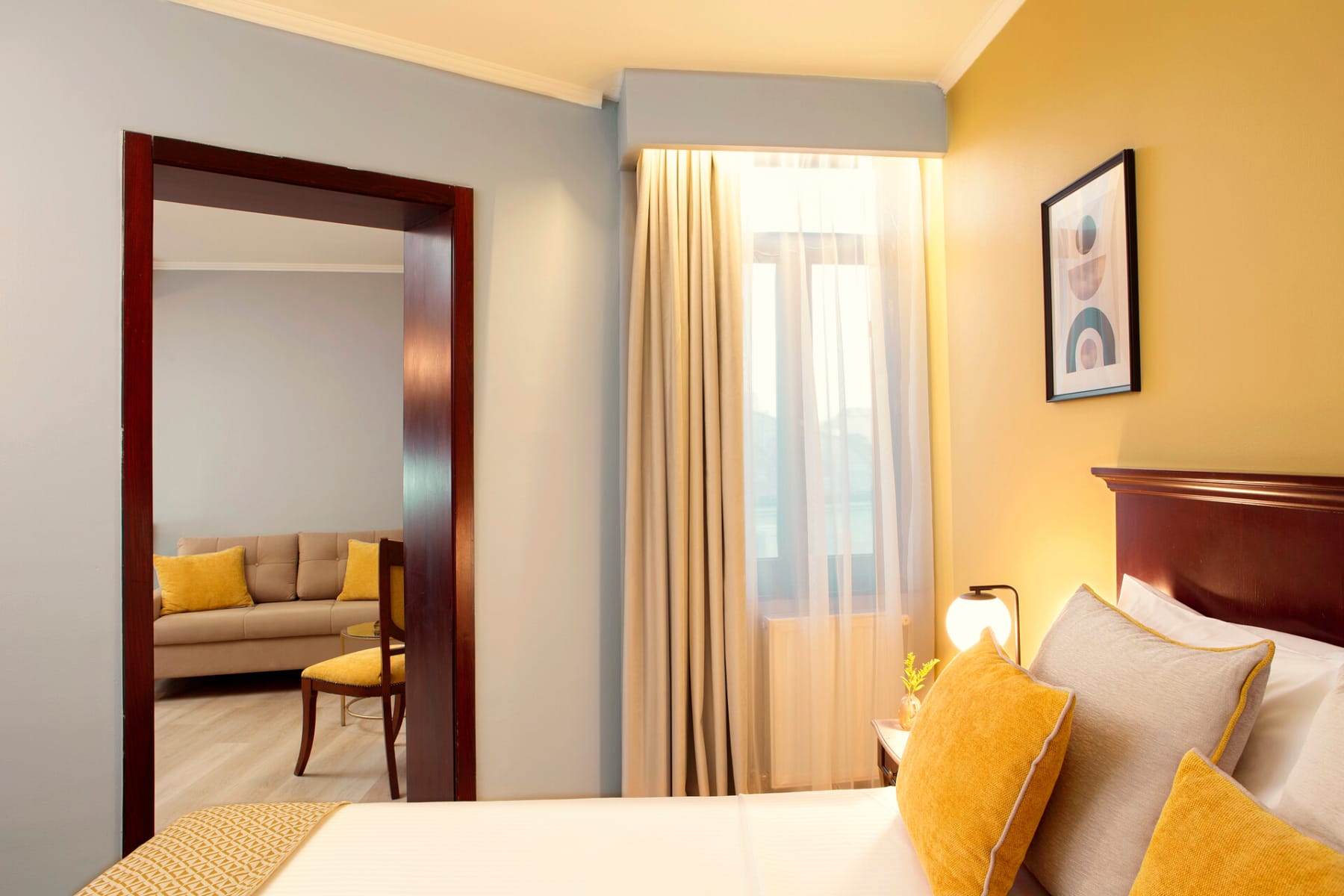 a bedroom with a large window