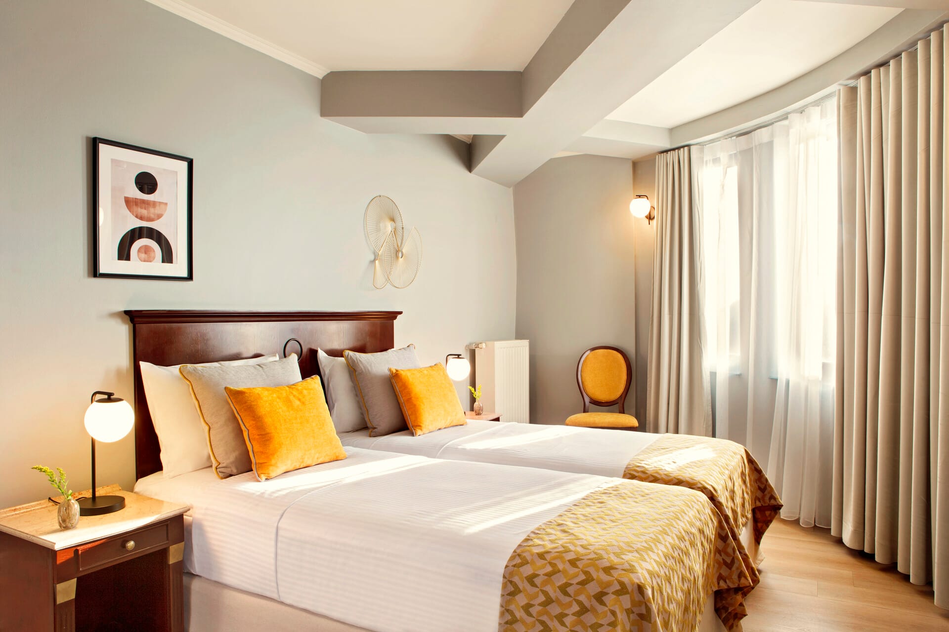 a bedroom with a bed and a lamp