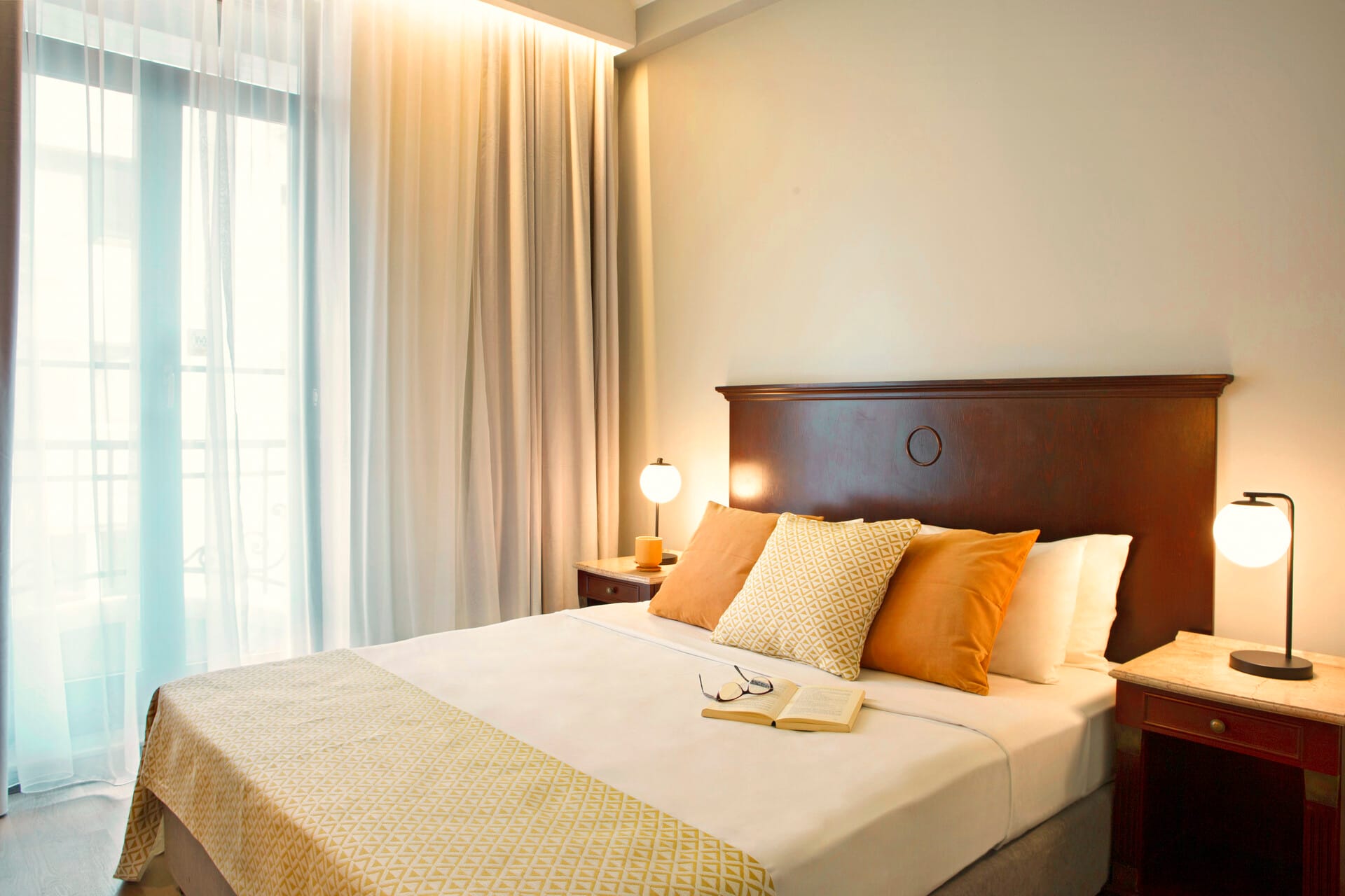 a bed with a white bed spread