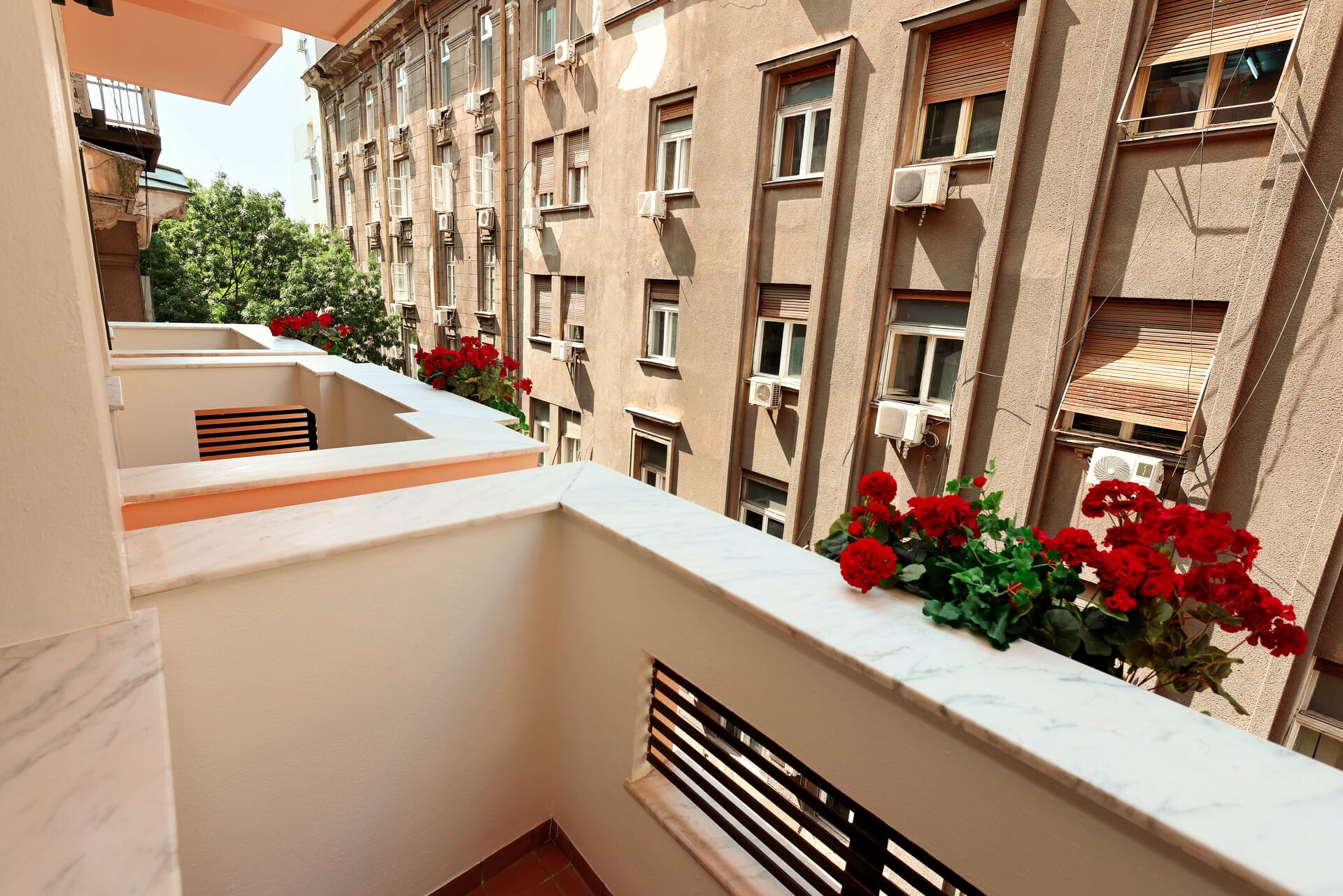 a balcony with flowers on it