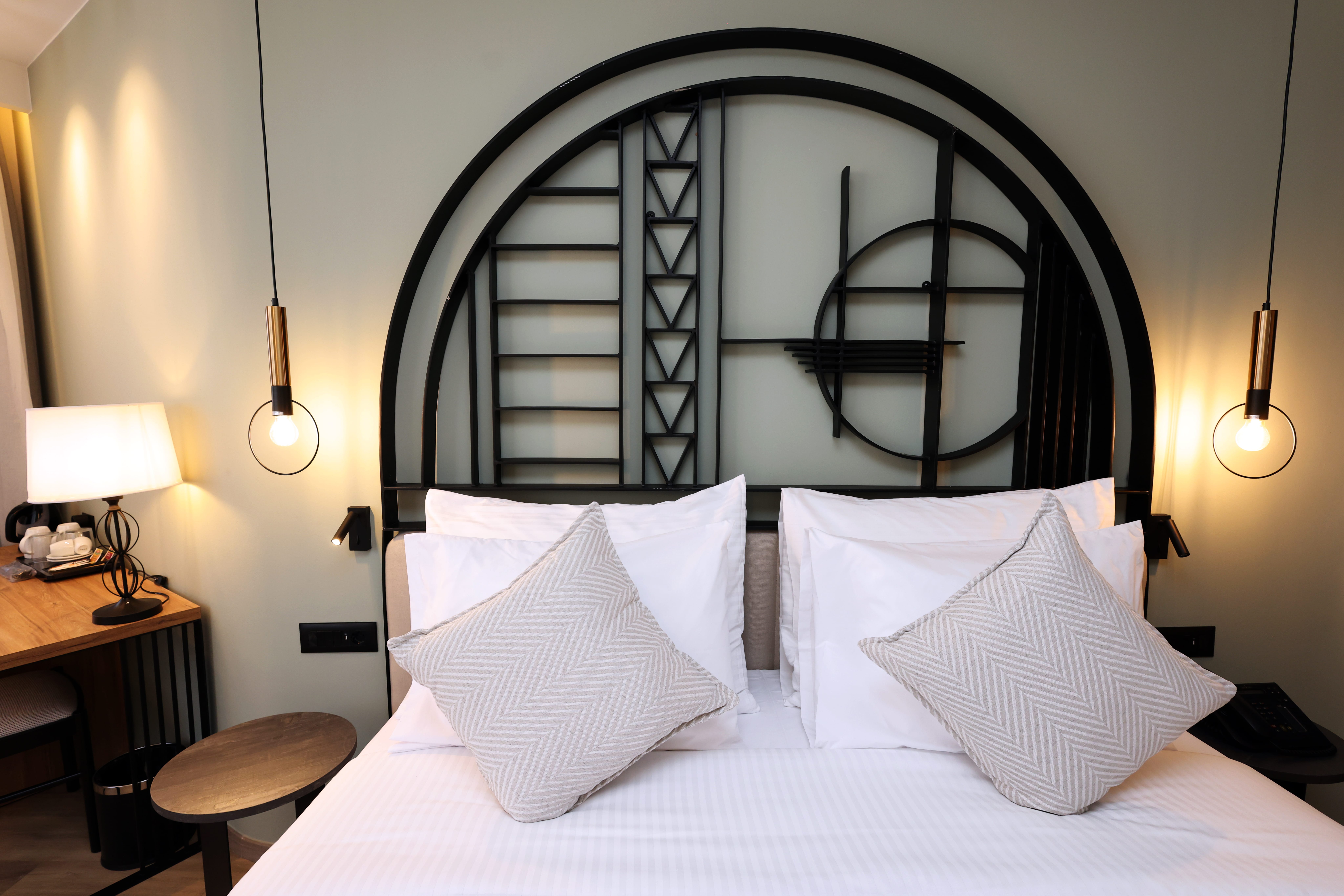 a bed with white sheets