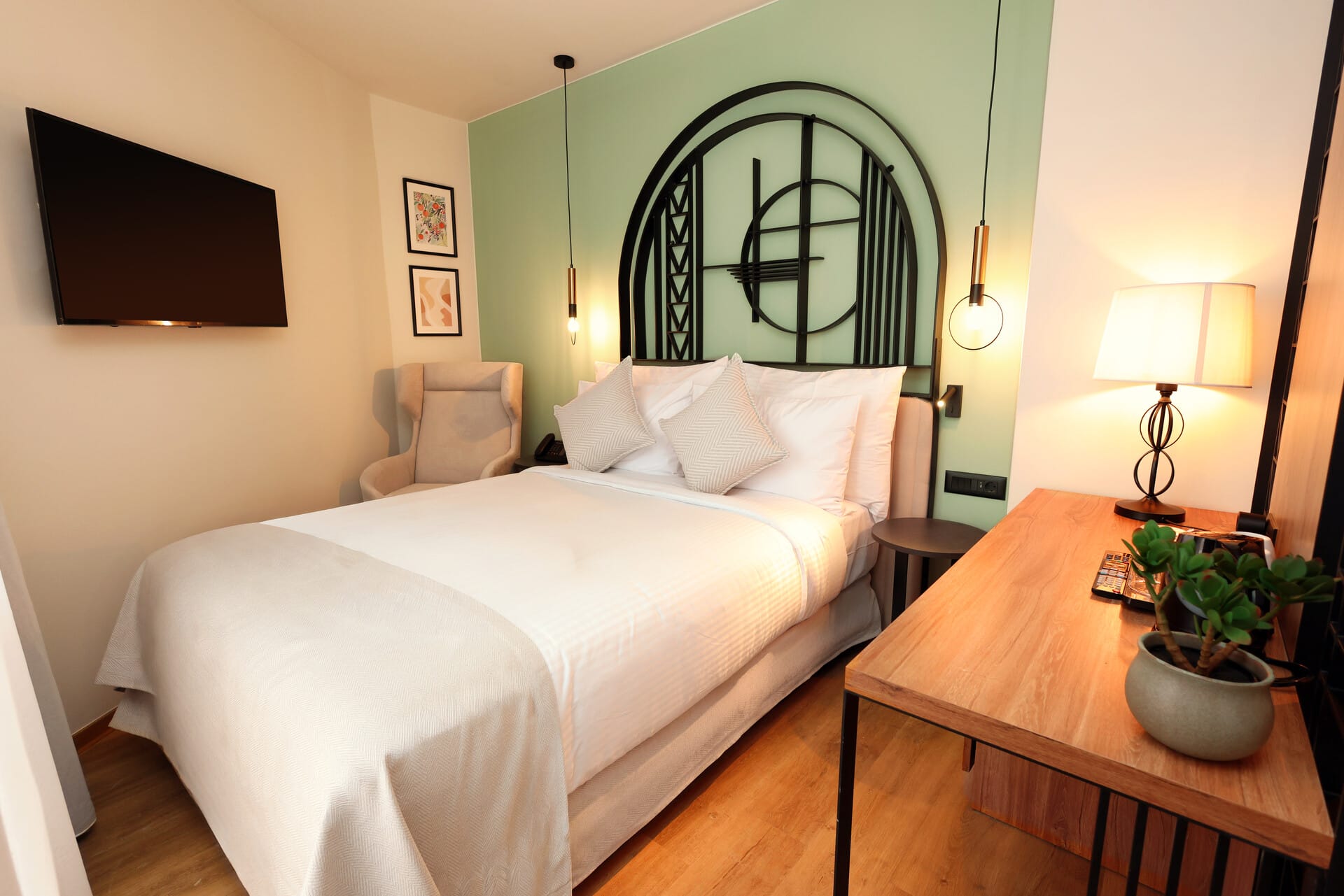 a hotel room with a bed and a table