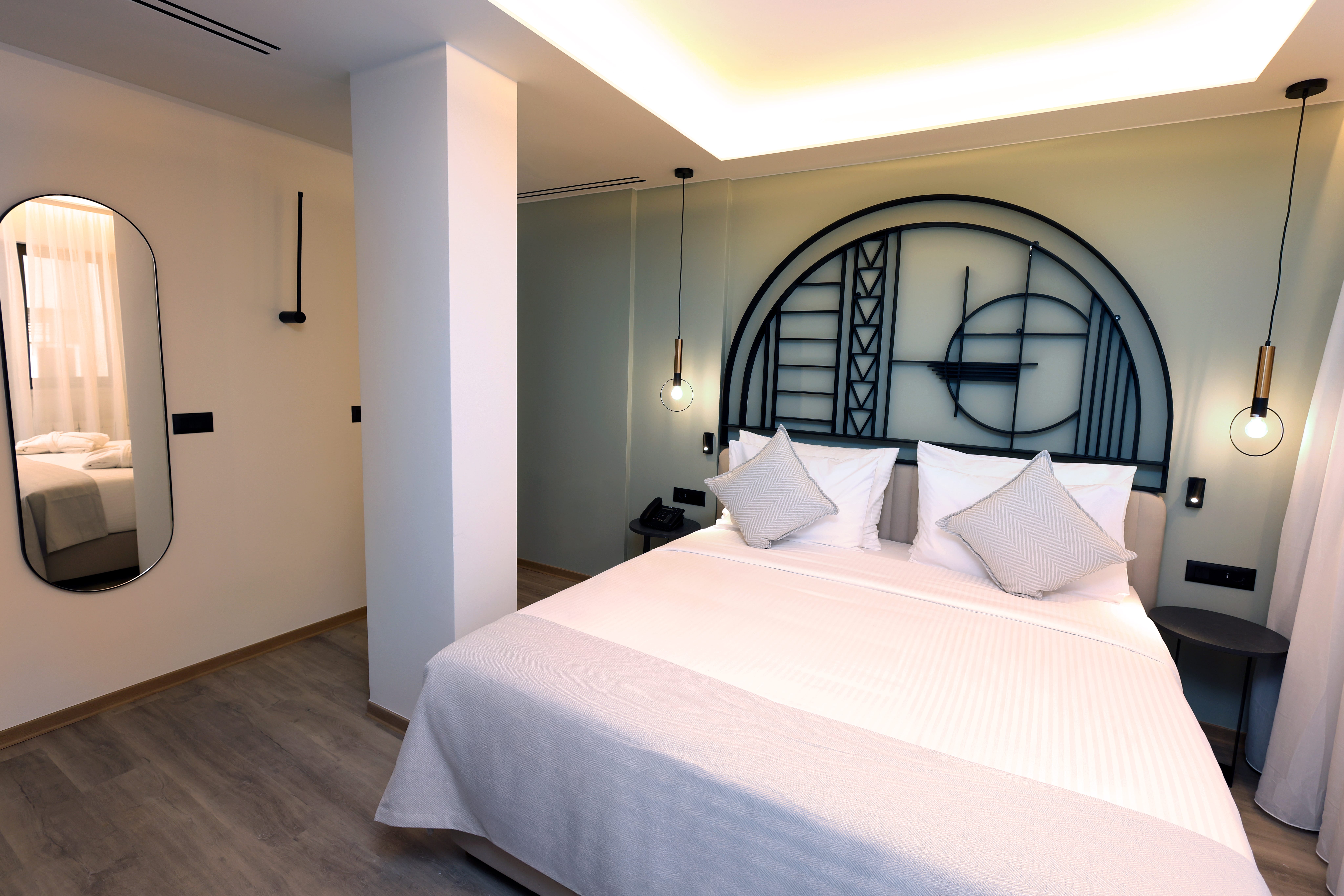 a bed with white sheets