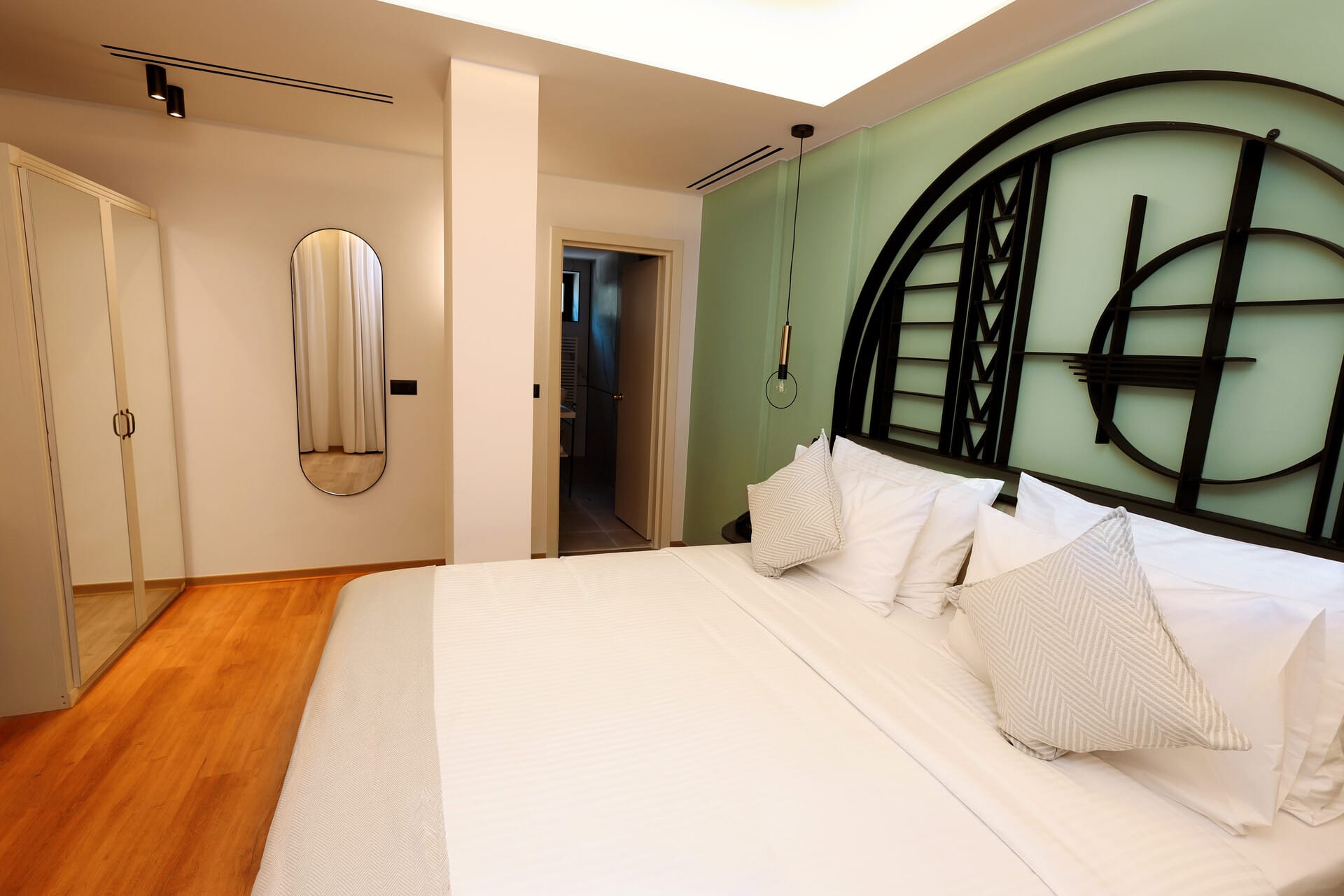 a bed with white sheets