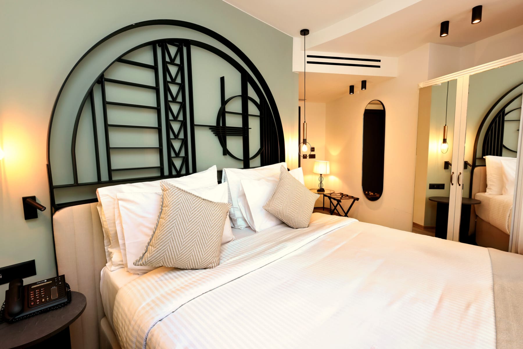 a bed with white sheets