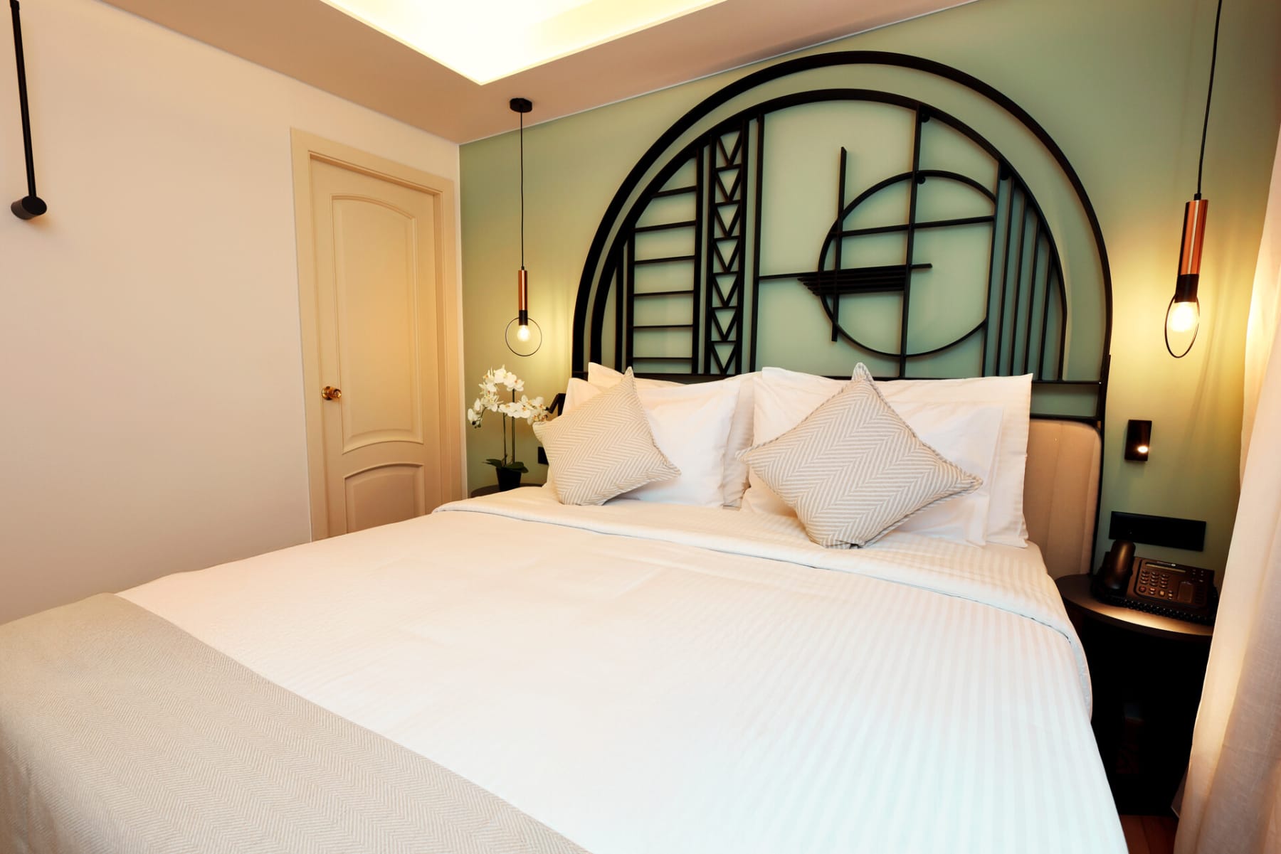 a bed with white sheets