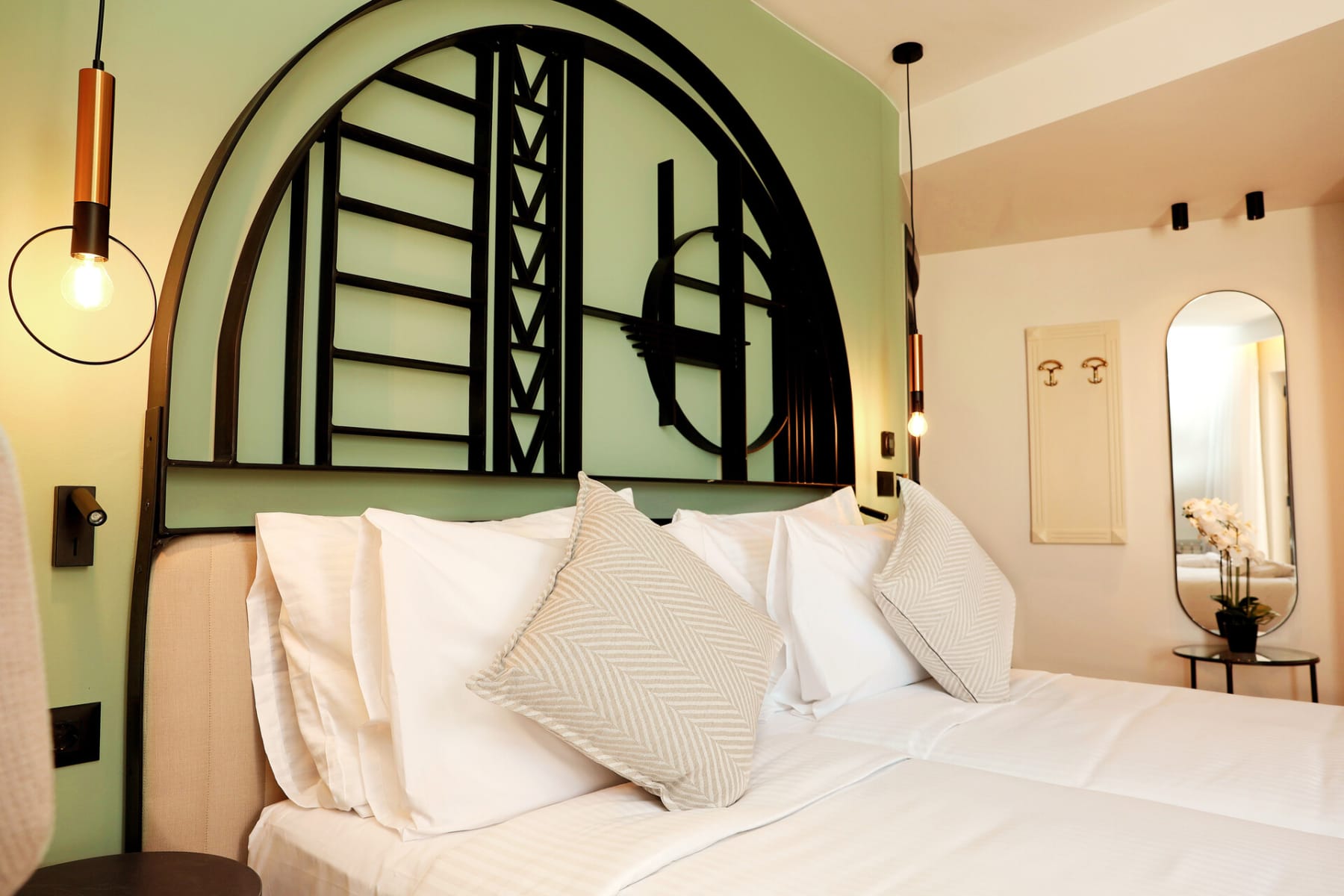 a bed with white pillows